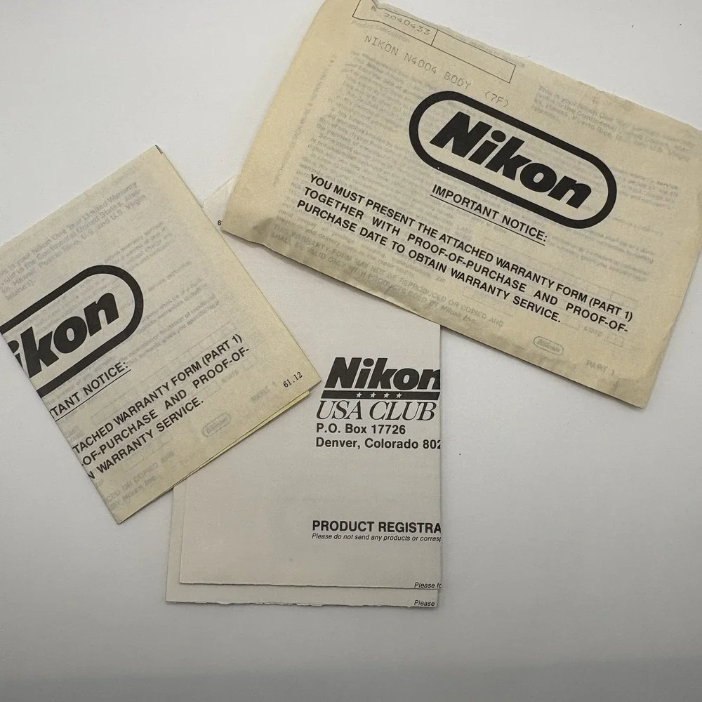 Vintage Nikon N4004 AF 35mm SLR Film Camera Body Only W/ Manuals Bag Powers On